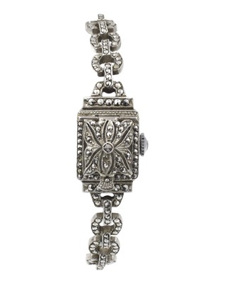 Lot 107 - A vintage silver ladies' locket watch