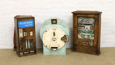 Lot 376 - A "Player's Cigarettes" Vending Machine, Horse Racing Themed Slot Machine and 'Stockbroker' Slot Machine