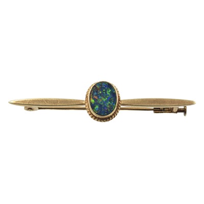 Lot 352 - A black opal doublet brooch, set in 10ct gold