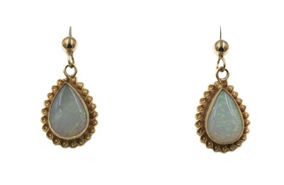 Lot 70 - A pair of opal earrings, set in 9ct gold
