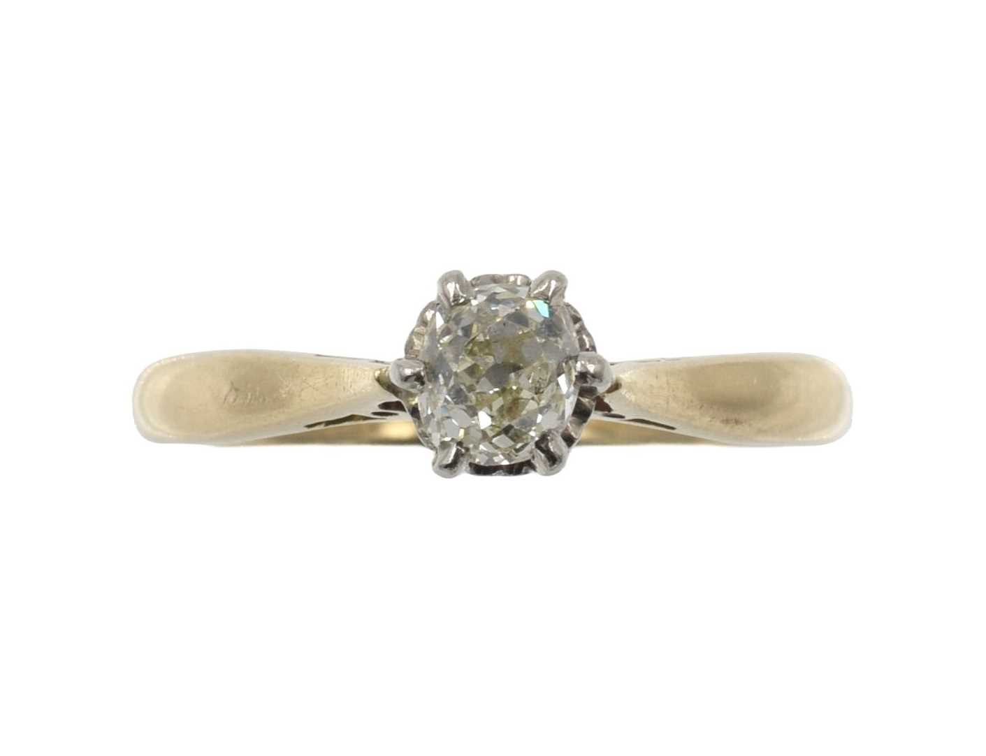 Lot An 18ct gold solitaire diamond ring