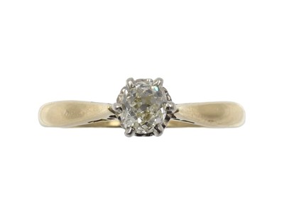 Lot An 18ct gold solitaire diamond ring