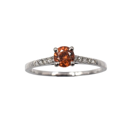 Lot 201 - A garnet and diamond solitaire ring