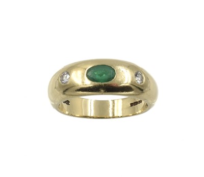 Lot 205 - A heavy emerald and diamond ring, set in 18ct gold