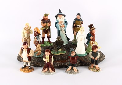 Lot 151 - A Set of Twelve Lord of the Rings Figures and Display Stand by Royal Doulton
