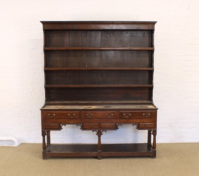 Lot 233 - A George III Oak Potboard Dresser