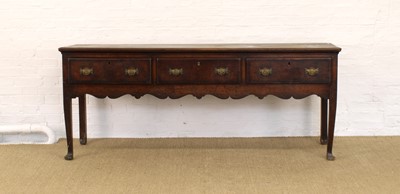 Lot 234 - A George III North Country Oak and Mahogany Dresser Base