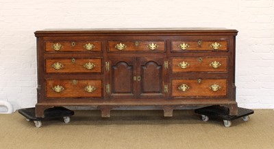 Lot 235 - A George III North Country Oak and Mahogany Dresser Base or Sideboard