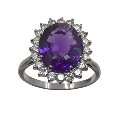 Lot 77 - An 18ct amethyst and diamond cluster ring