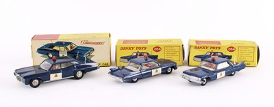 Lot 344 - Three R.C.M.P Cars Dinky Toys Diecast Models by Meccano Ltd.