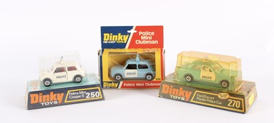 Lot 347 - Three Police Car Dinky Toys Diecast Models by Meccano Ltd.