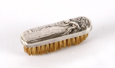 Lot 13 - A Small Continental Silver Mounted 'Fishing Boy' Brush