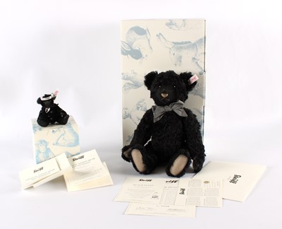 Lot 373 - A "Black Petsy" Teddy Bear and "Crystal Teddy Bear Bag Pendant" by Steiff, Germany