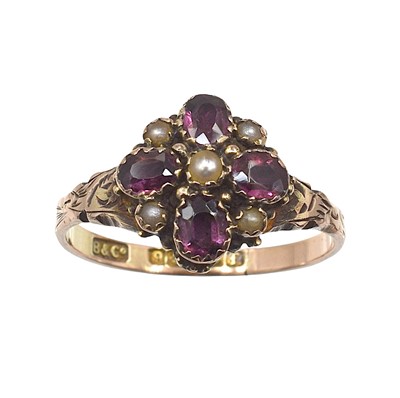 Lot 131 - An Edwardian 9ct gold, garnet and split pearl cluster ring
