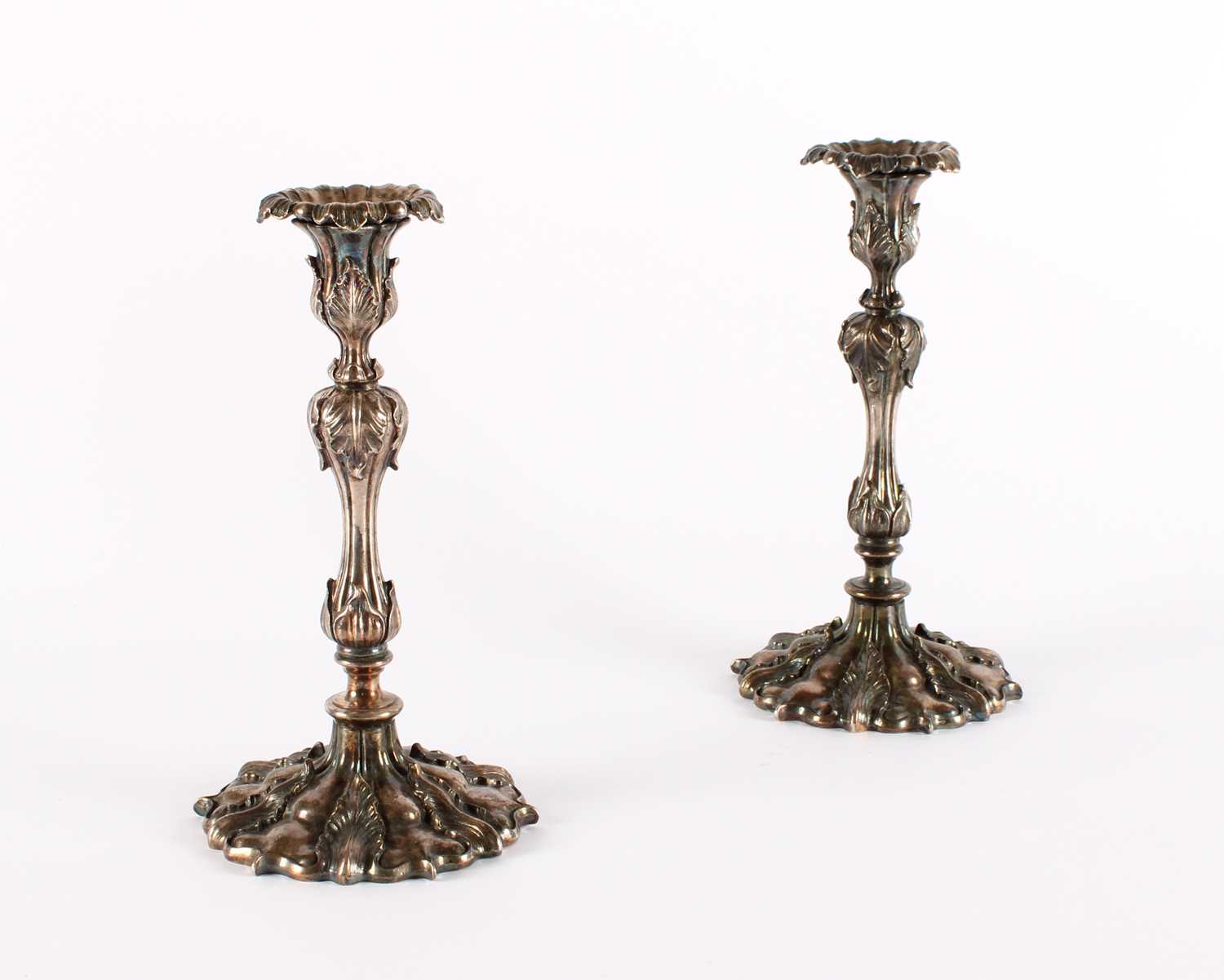 Lot 54 - A Pair of 19th Century 'Rococo Revival' Silver Plated Candlesticks