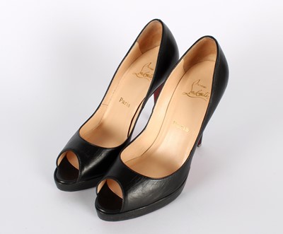 Lot A pair of Christian Louboutin “Very Privé” Peep-Toe heels