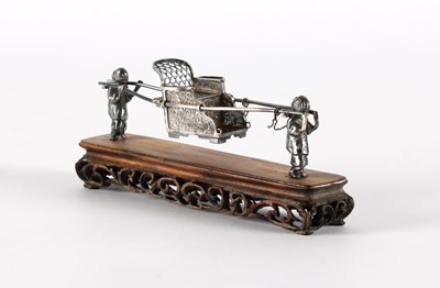 Lot 67 - A Small Early 20th Century Chinese Export White Metal Model of a Sedan Chair