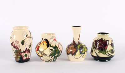 Lot 125 - Four Floral Ivory Vases by Moorcroft