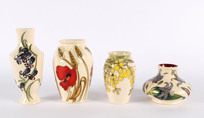 Lot 126 - Four Floral Ivory Vases by Moorcroft