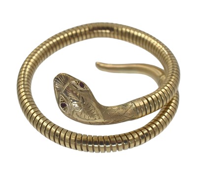 Lot 154 - A 9ct gold snake bangle, by Smith and Pepper