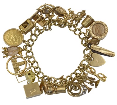 Lot 90 - A 9ct gold charm bracelet