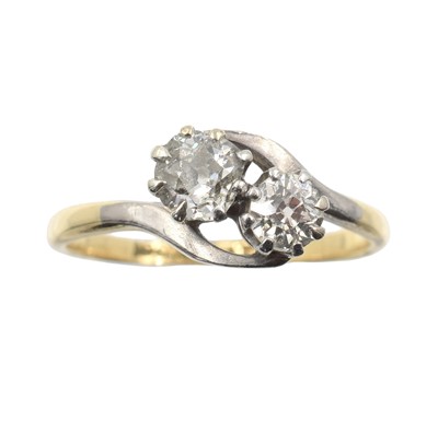 Lot An 18ct gold/platinum two-stone diamond ring