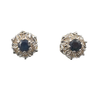 Lot 117 - A pair of sapphire and platinum earrings