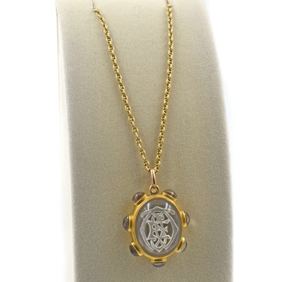 Lot A late Victorian reverse intaglio rock crystal pendant and 15ct gold chain