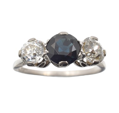 Lot 100 - A diamond and sapphire trilogy ring