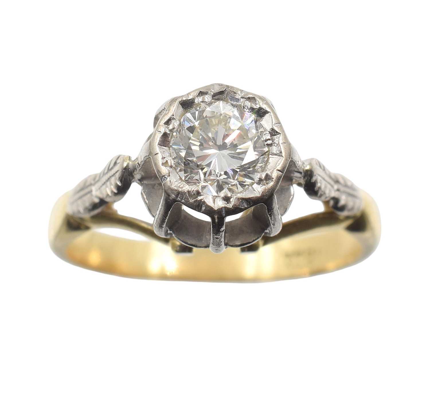 Lot An 18ct gold and diamond solitaire ring