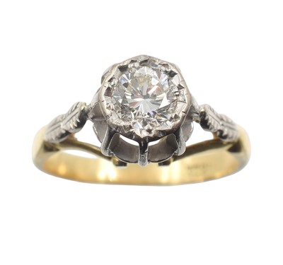 Lot An 18ct gold and diamond solitaire ring