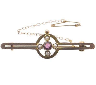 Lot A 9ct Edwardian garnet and split-pearl brooch