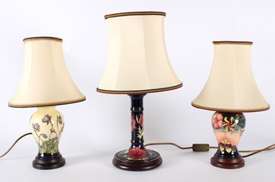 Lot 124 - Three Table Lamps by Moorcroft