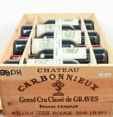 Lot 21 - 12 bottles in OWC Chateau Carbonnieux Rouge Grand Cru Classe de Graves 2010