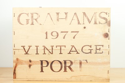 Lot 45 - 10 bottles in OWC Graham’s Vintage Port 1977