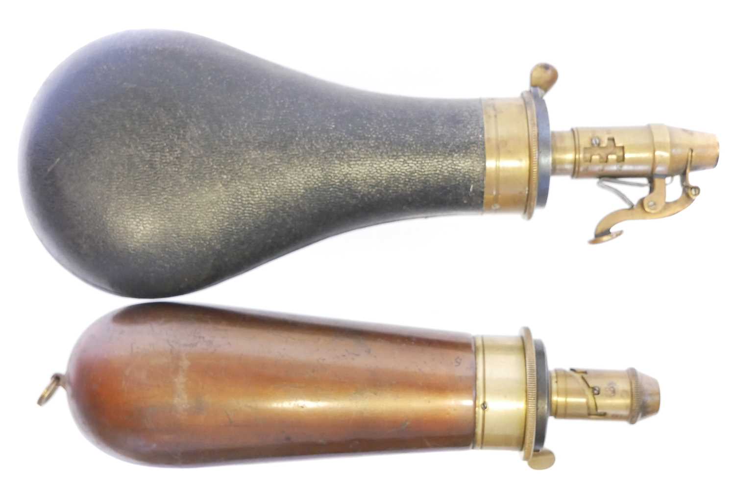Lot 716 - Two powder flasks, one by Parker Hale after...