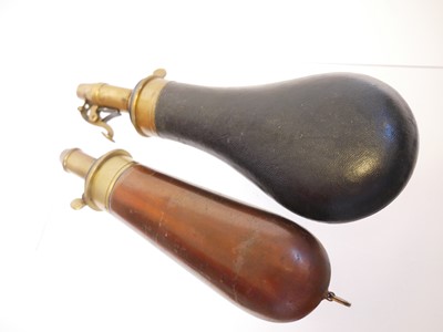 Lot 716 - Two powder flasks, one by Parker Hale after...