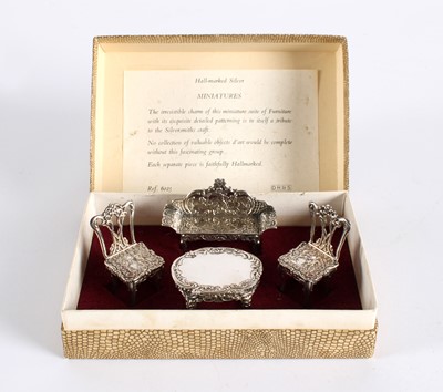 Lot 10 - A Suite of Elizabeth II Silver Miniature or Doll's House Furniture Presented in the Original Fitted Box
