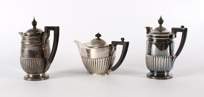 Lot 36 - A Matched Victorian Silver Teapot and Hot Water Pot
