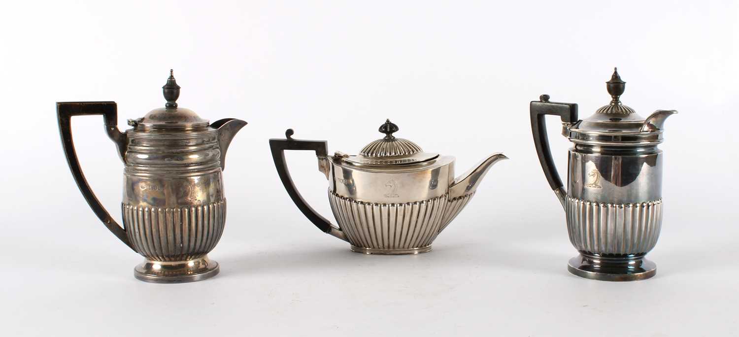 Lot 36 - A Matched Victorian Silver Teapot and Hot Water Pot