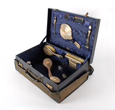 Lot 25 - A George V Silver Mounted Travelling Vanity Set in Fitted Case Retailed by Finnigans of Manchester