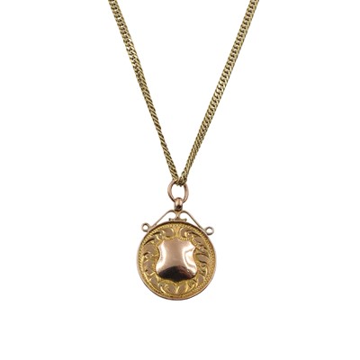 Lot A 9ct gold shield coin pendant and chain