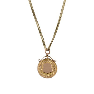 Lot A 9ct gold shield coin pendant and chain