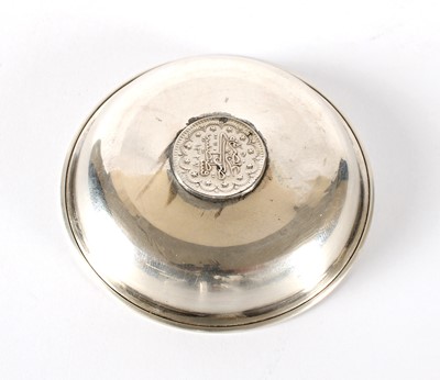 Lot 20 - An Eastern White Metal Coin Set Trinket Dish