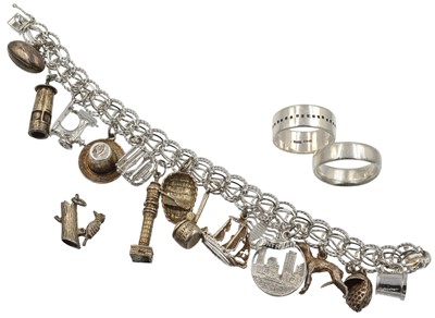 Lot A selection of 2 sterling silver rings and a white metal charm bracelet