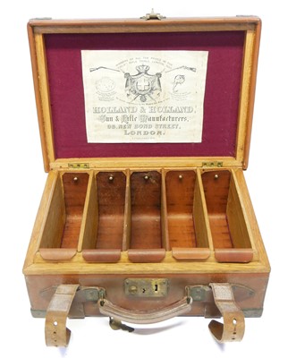 Lot 785 - Leather and brass cartridge magazine, oak...