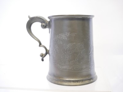 Lot 714 - Pewter rifle competition tankard, depicting a...