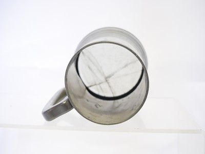 Lot 714 - Pewter rifle competition tankard, depicting a...