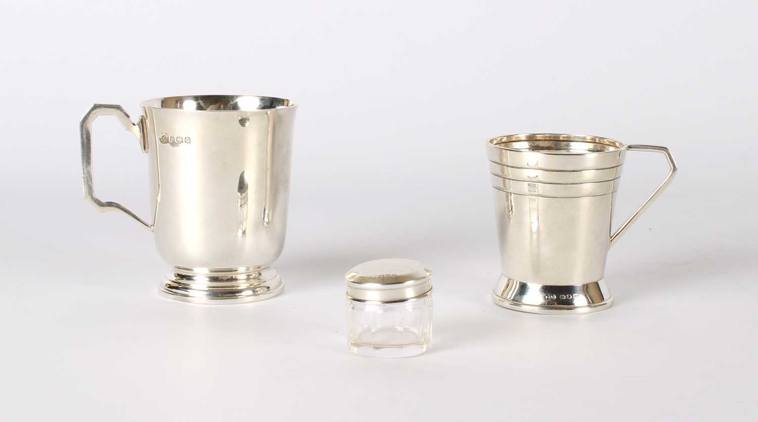 Lot 4 - Two George VI Silver Christening Mugs and a small Chester Silver Topped Vanity Jar