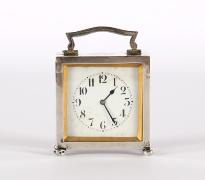 Lot 13 - An Early 20th Century Silver Mounted Bedside or Travelling Clock